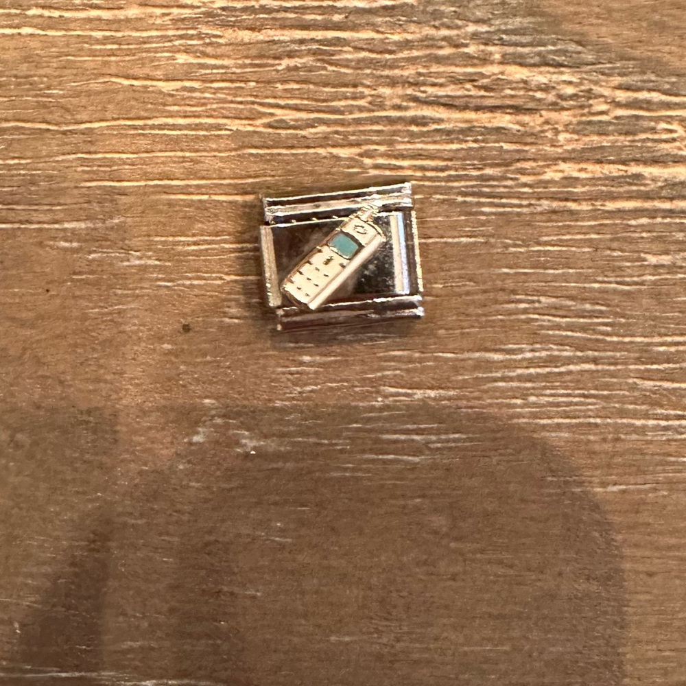 Silver phone charm
